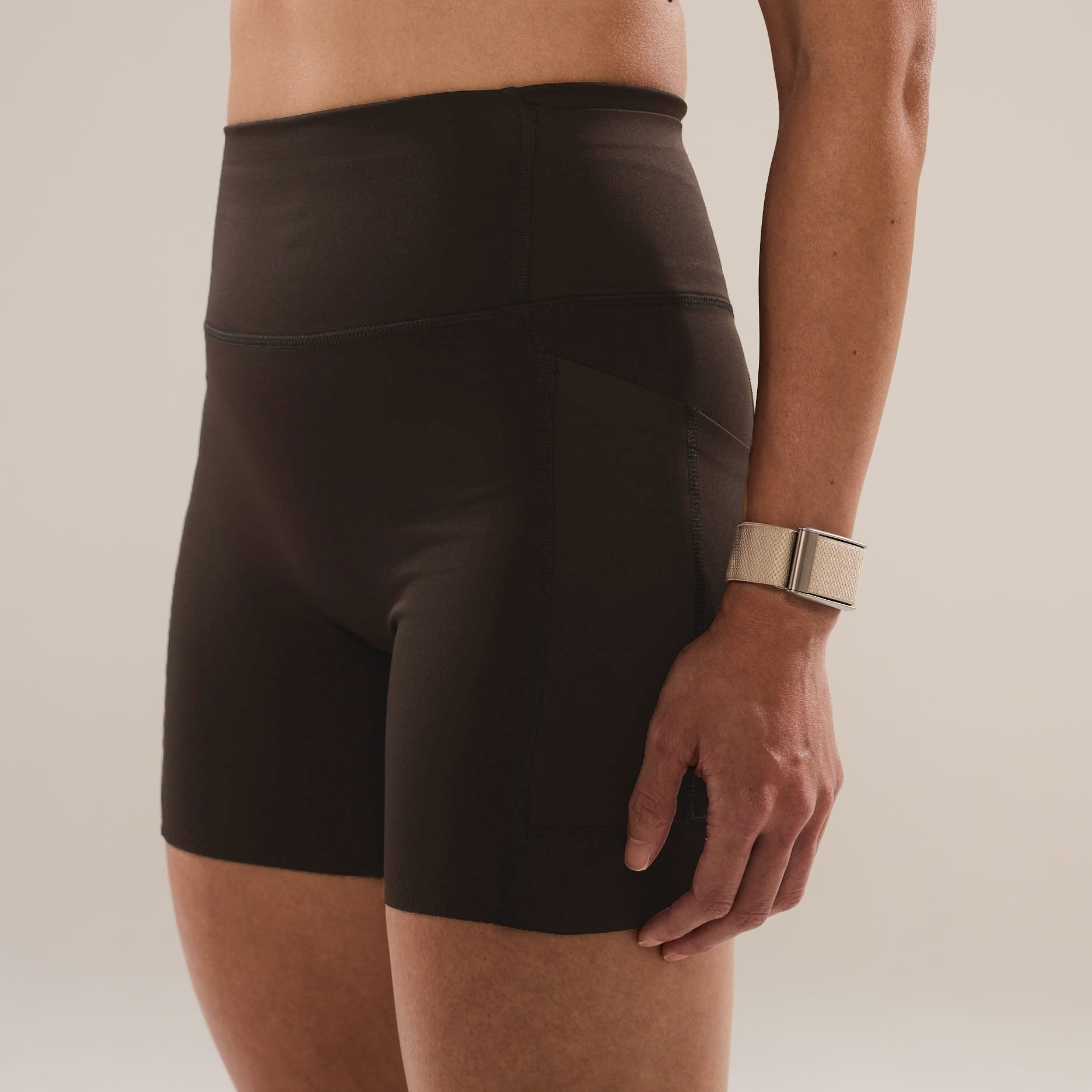 Anya Active 42 Compression Shorts in Espresso, women's dark brown compression shorts, close-up side view
