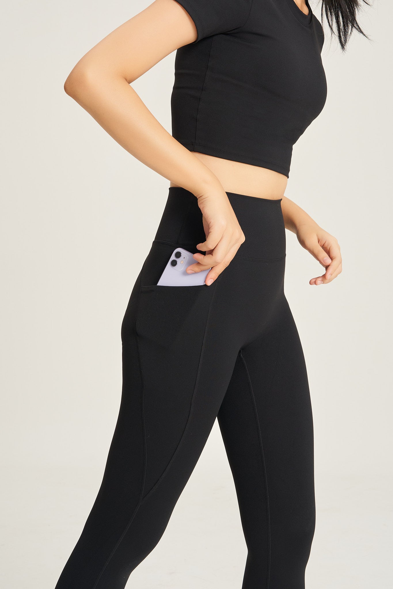 Mila High-Waisted Capri Legging With Pocket in Black | Fabletics