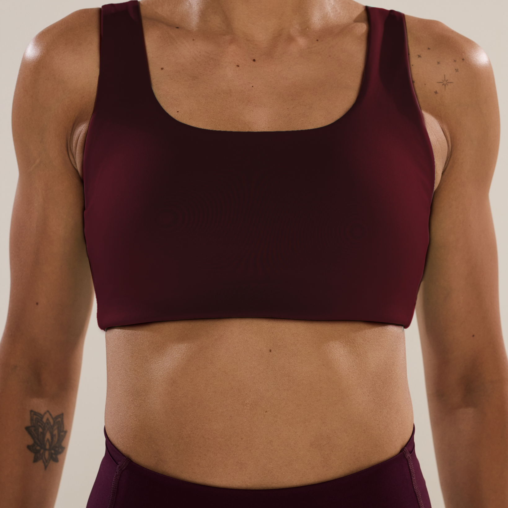 Anya Active Super Bra in Winetasting, women's burgundy scoop-neck running sports bra with cut-out back, front close-up