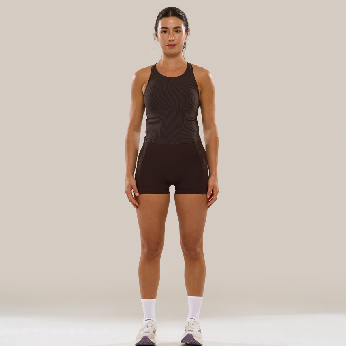 Anya Active Trophy fitted ribbed racerback crop top in Ganache, a snug workout crop.